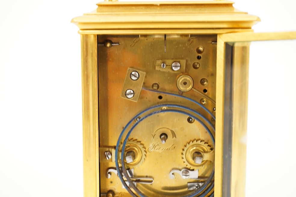 A late 19th century French Champlevé enamel repeating carriage clock